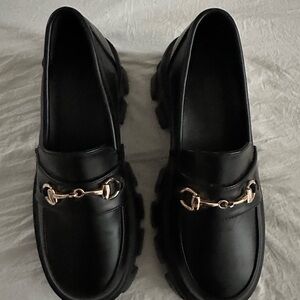 Elegant Black Loafers with Gold Accent